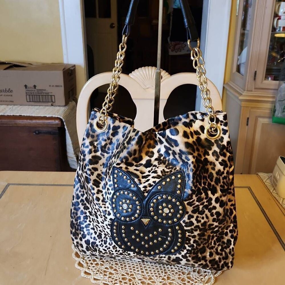 Leopard print and black owl shoulder bag